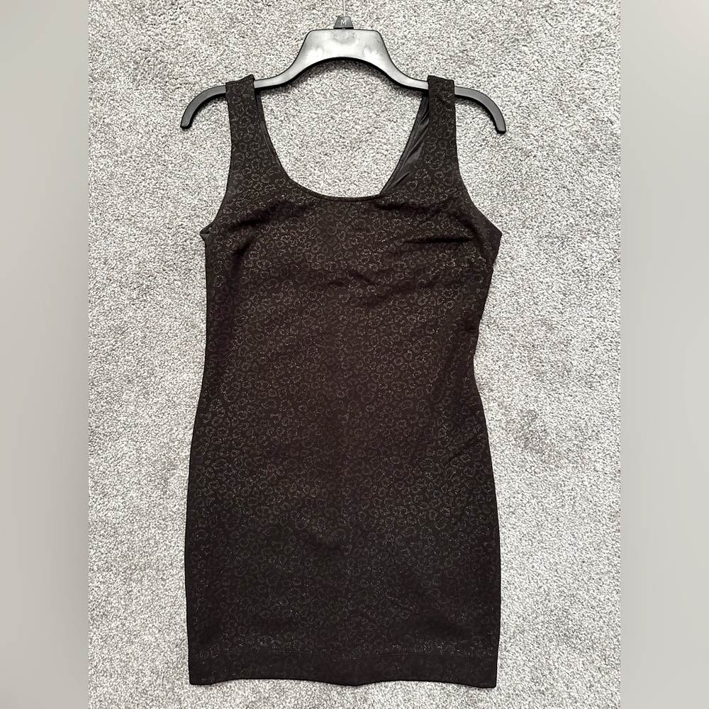 Black dress with light gold shimmer leopard print. Forever21 size medium.